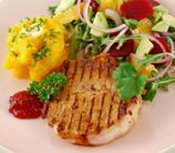 Spice-Rubbed Pork Chops with Raspberry-Mango Salsa