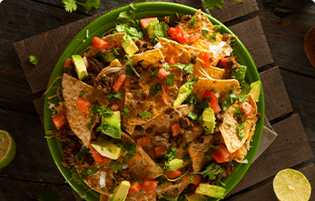 Crispy Nachos Loaded with Gooey Toppings.