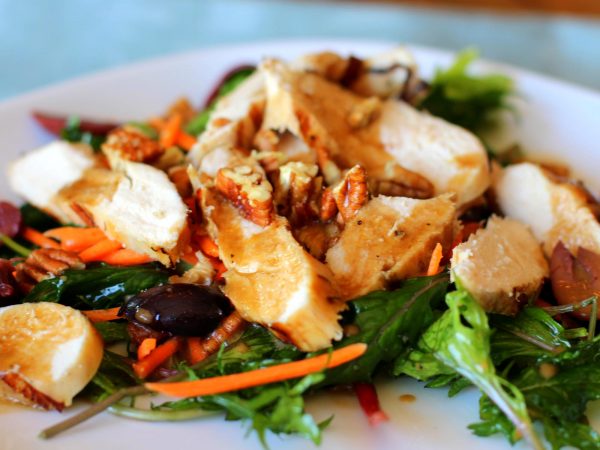 Image from a post with the title: Arugula Chicken Salad with Olives & Pecans.